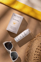 Miada Beauty Sun Care 50 Faktör Tüm Ciltler İçin Leke Karşıtı Nemlendirici Yağsız Suya Dayanıklı Yüz ve Vücut Güneş Kremi 50 ml