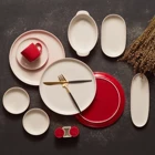 Karaca Nordic Red Oval-Yuvarlak 27 Parça 6 Kişilik Porselen Kahvaltı Takımı Beyaz-Kırmızı